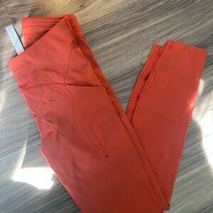 LULULEMON rust colored leggings